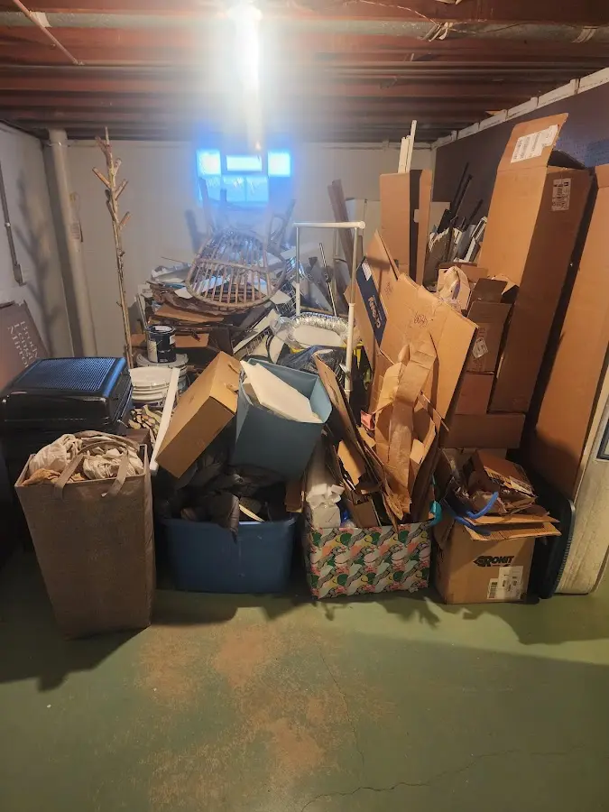 Roll-off dumpster container at job site for 8 Yard Dumpster Rental in Commercial Point